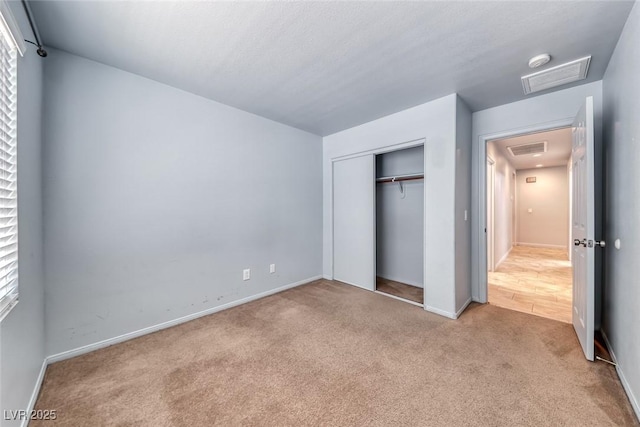 3604 Cantura Crest Ct, North Las Vegas, NV 89031 - unfurnished bedroom featuring carpet flooring, a closet, and attic access