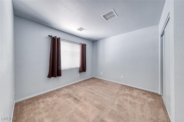 3604 Cantura Crest Ct, North Las Vegas, NV 89031 - spare room featuring carpet floors and a textured ceiling
