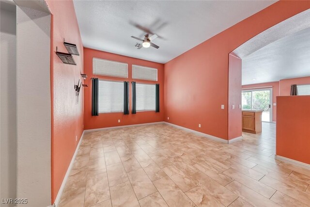 3604 Cantura Crest Ct, North Las Vegas, NV 89031 - spare room featuring ceiling fan and baseboards