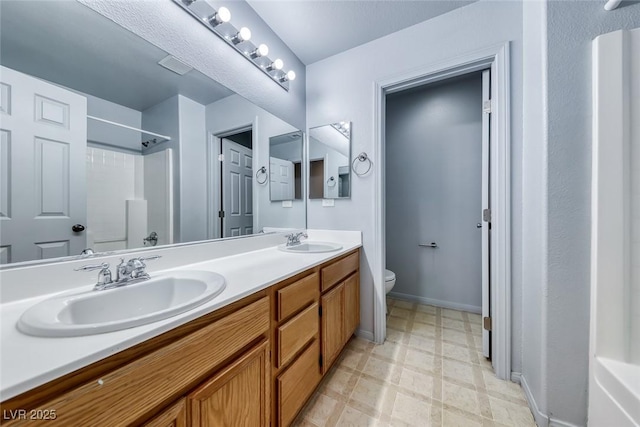 3604 Cantura Crest Ct, North Las Vegas, NV 89031 - full bathroom featuring double vanity, a shower, and tile patterned floors