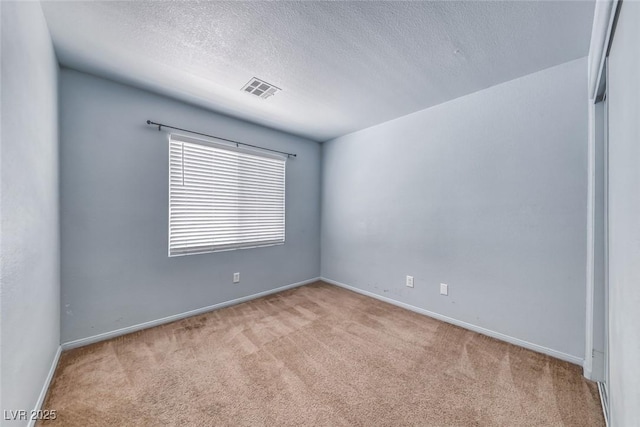 3604 Cantura Crest Ct, North Las Vegas, NV 89031 - carpeted spare room with a textured ceiling and baseboards