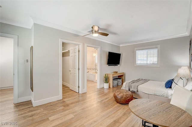 925 Alan Shepard St, Las Vegas, NV 89145 - bedroom featuring crown molding, light wood-style floors, a ceiling fan, and connected bathroom
