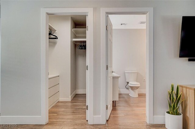 925 Alan Shepard St, Las Vegas, NV 89145 - bathroom with wood finished floors and vanity