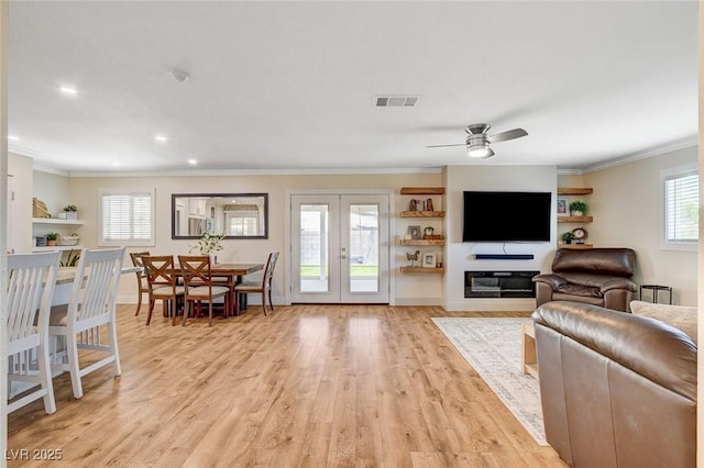 925 Alan Shepard St, Las Vegas, NV 89145 - living area featuring ornamental molding, ceiling fan, light wood-style flooring, french doors, and recessed lighting