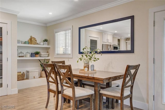 925 Alan Shepard St, Las Vegas, NV 89145 - dining room featuring light wood-style flooring, ornamental molding, and recessed lighting