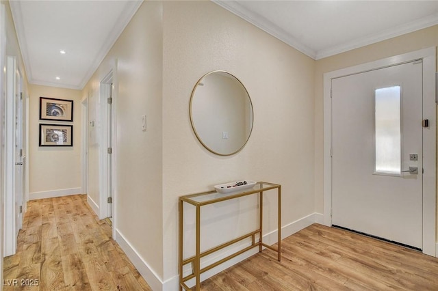 925 Alan Shepard St, Las Vegas, NV 89145 - foyer with light wood finished floors, ornamental molding, and recessed lighting
