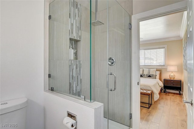 925 Alan Shepard St, Las Vegas, NV 89145 - ensuite bathroom featuring a shower stall, hardwood / wood-style flooring, and ornamental molding