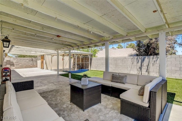 925 Alan Shepard St, Las Vegas, NV 89145 - fenced backyard with an outdoor living space, a patio area, and a storage shed