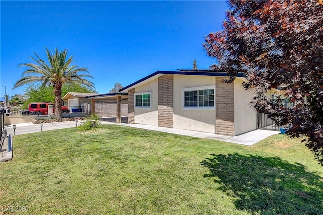 925 Alan Shepard St, Las Vegas, NV 89145 - rear view of property with stucco siding, a garage, and concrete driveway