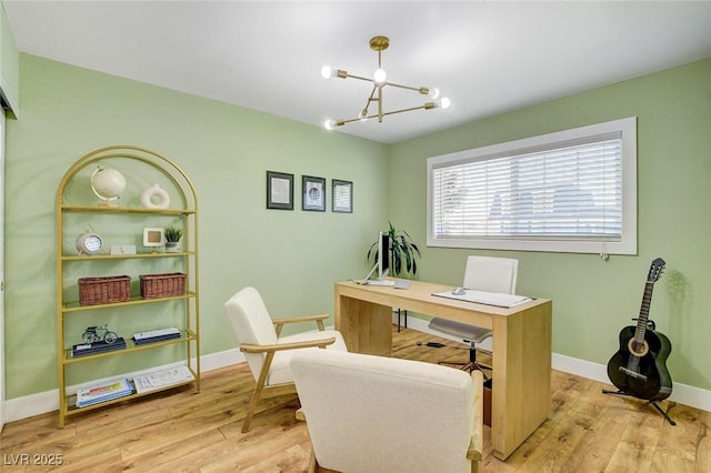 925 Alan Shepard St, Las Vegas, NV 89145 - home office with a chandelier and wood finished floors