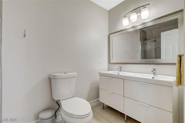 925 Alan Shepard St, Las Vegas, NV 89145 - full bathroom with double vanity, a shower with door, and tile patterned floors