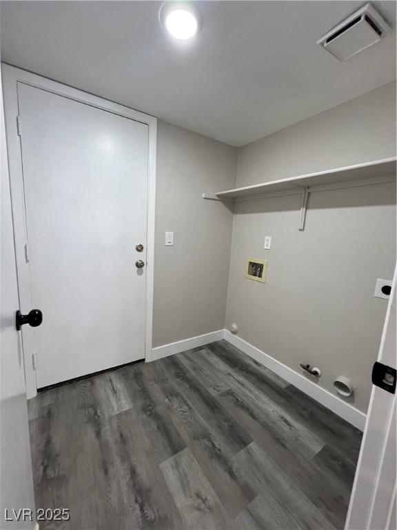 3238 Canyon Terrace Dr, Laughlin, NV 89029 - laundry area with hookup for a gas dryer, hookup for a washing machine, and dark wood-style flooring