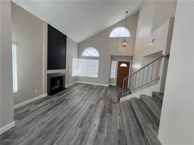 3238 Canyon Terrace Dr, Laughlin, NV 89029 - entrance foyer featuring high vaulted ceiling, wood finished floors, stairs, and a premium fireplace