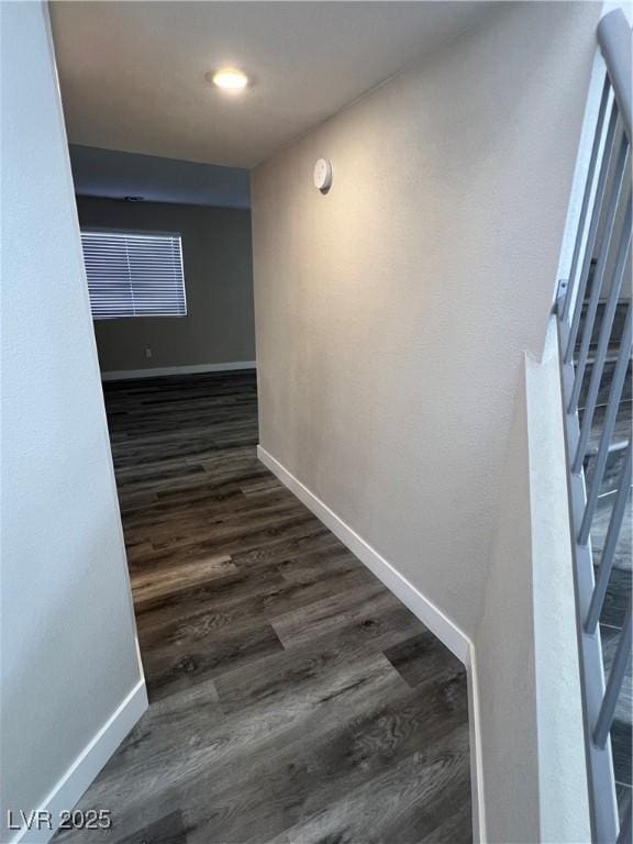 3238 Canyon Terrace Dr, Laughlin, NV 89029 - hallway featuring dark wood-type flooring and stairway