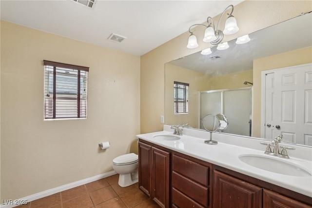 11620 Longhirst Hall Ln, Las Vegas, NV 89138 - bathroom featuring double vanity, a stall shower, and tile patterned flooring