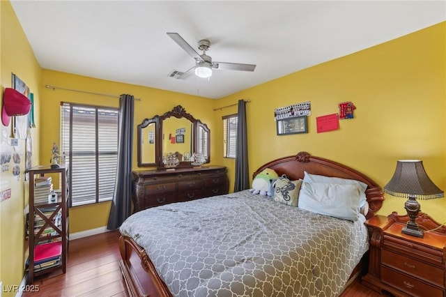 11620 Longhirst Hall Ln, Las Vegas, NV 89138 - bedroom featuring multiple windows, wood finished floors, and ceiling fan