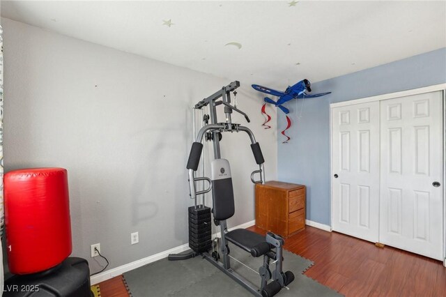 11620 Longhirst Hall Ln, Las Vegas, NV 89138 - workout area featuring wood finished floors and baseboards