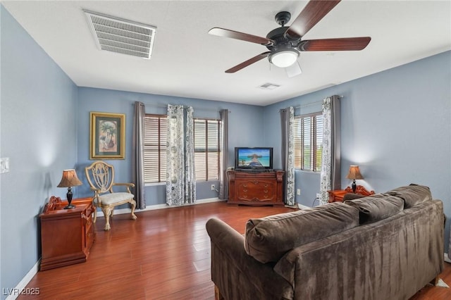 11620 Longhirst Hall Ln, Las Vegas, NV 89138 - living area featuring plenty of natural light, wood finished floors, and ceiling fan