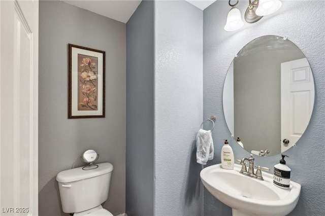 11620 Longhirst Hall Ln, Las Vegas, NV 89138 - bathroom featuring toilet and a sink