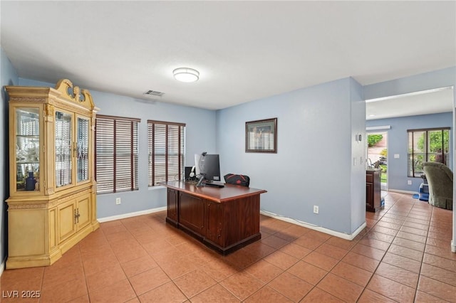 11620 Longhirst Hall Ln, Las Vegas, NV 89138 - office area featuring light tile patterned flooring and baseboards