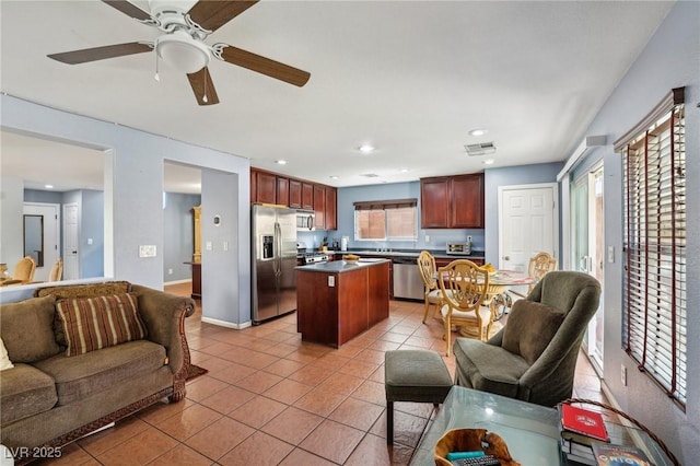 11620 Longhirst Hall Ln, Las Vegas, NV 89138 - living room featuring light tile patterned flooring, a ceiling fan, and recessed lighting