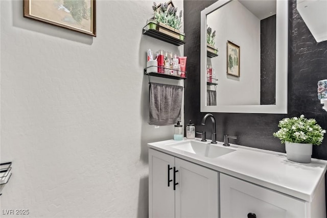 6313 Voss St, North Las Vegas, NV 89081 - bathroom with vanity and a textured wall