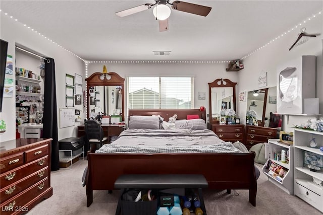 6313 Voss St, North Las Vegas, NV 89081 - bedroom featuring light colored carpet and a ceiling fan
