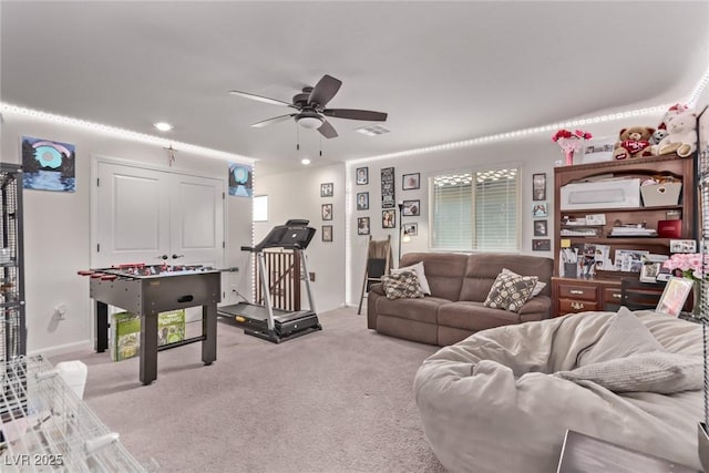 6313 Voss St, North Las Vegas, NV 89081 - living area with ceiling fan and light colored carpet