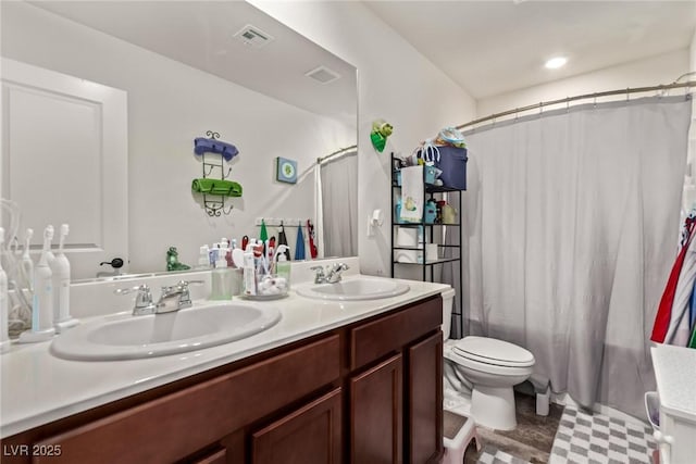 6313 Voss St, North Las Vegas, NV 89081 - bathroom with double vanity and tile patterned floors