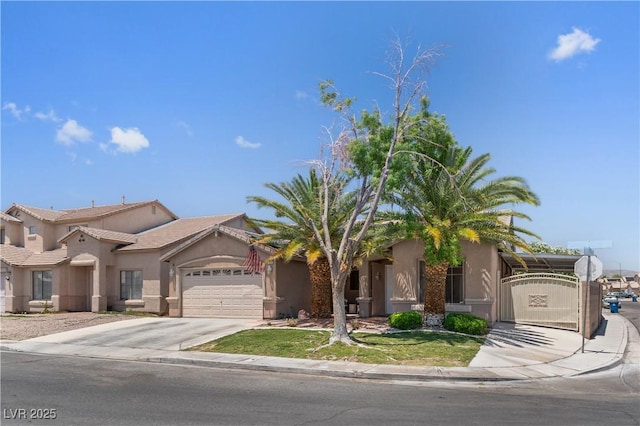 1310 Ripplestone Ave, North Las Vegas, NV 89081 - view of front facade featuring stucco siding, a garage, and concrete driveway