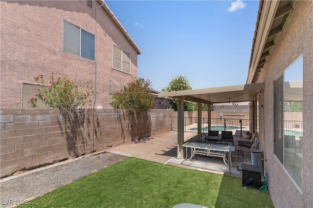 1310 Ripplestone Ave, North Las Vegas, NV 89081 - fenced backyard featuring a patio area