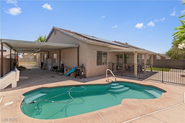 1310 Ripplestone Ave, North Las Vegas, NV 89081 - view of swimming pool featuring a patio and a fenced backyard