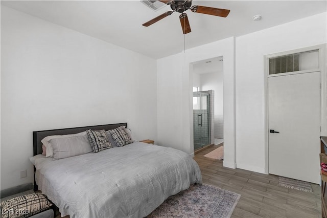 1310 Ripplestone Ave, North Las Vegas, NV 89081 - bedroom featuring wood finished floors, ceiling fan, and ensuite bathroom