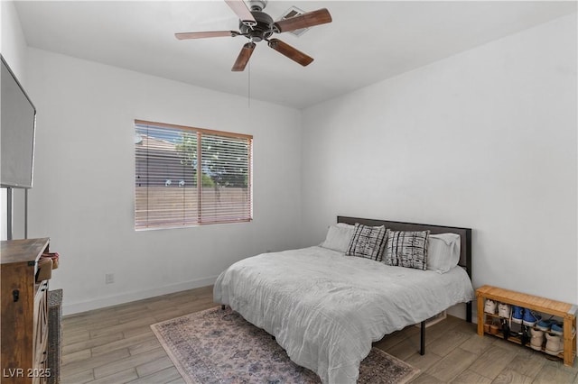 1310 Ripplestone Ave, North Las Vegas, NV 89081 - bedroom with light wood finished floors and a ceiling fan