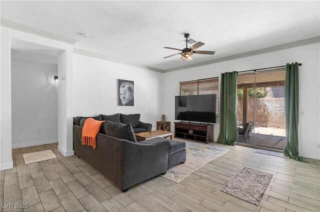 1310 Ripplestone Ave, North Las Vegas, NV 89081 - living room featuring a ceiling fan, light wood-style flooring, and crown molding