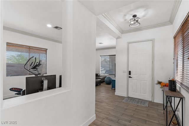 1310 Ripplestone Ave, North Las Vegas, NV 89081 - foyer entrance featuring crown molding and wood finished floors