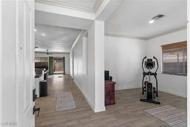 1310 Ripplestone Ave, North Las Vegas, NV 89081 - workout room with crown molding, wood finished floors, a ceiling fan, and recessed lighting
