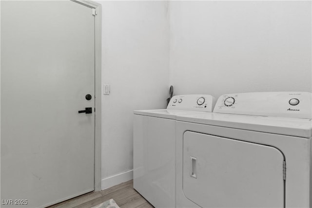 1310 Ripplestone Ave, North Las Vegas, NV 89081 - washroom with washing machine and dryer and light wood-style floors