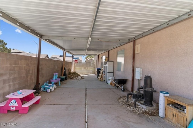 1310 Ripplestone Ave, North Las Vegas, NV 89081 - fenced backyard featuring a patio area and a gate