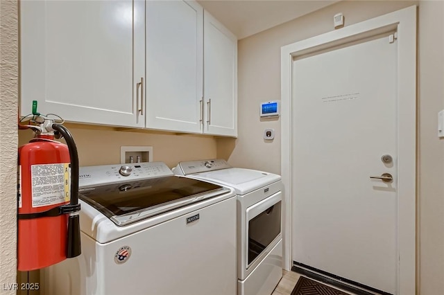 6316 Bluejay Way, Las Vegas, NV 89146 - laundry area with washer and clothes dryer and cabinet space