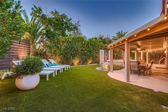 6316 Bluejay Way, Las Vegas, NV 89146 - view of grassy yard with a patio