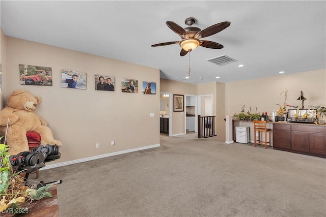 7854 Brianna Cheerful Ave, Las Vegas, NV 89178 - living area with a dry bar, a ceiling fan, light carpet, and recessed lighting