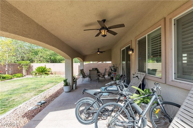 7854 Brianna Cheerful Ave, Las Vegas, NV 89178 - fenced backyard featuring a patio area and ceiling fan