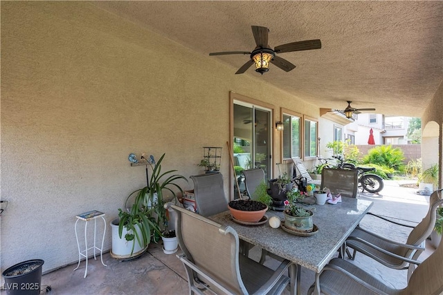 7854 Brianna Cheerful Ave, Las Vegas, NV 89178 - view of patio / terrace with a ceiling fan and outdoor dining area
