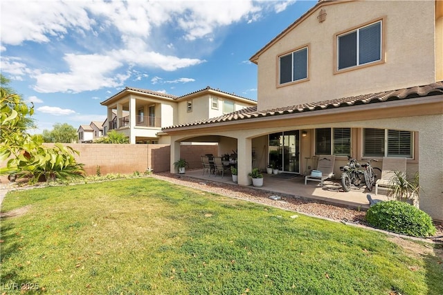 7854 Brianna Cheerful Ave, Las Vegas, NV 89178 - back of house featuring stucco siding, a patio, and a tile roof