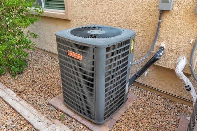 7854 Brianna Cheerful Ave, Las Vegas, NV 89178 - exterior view of a central air condition unit and stucco siding