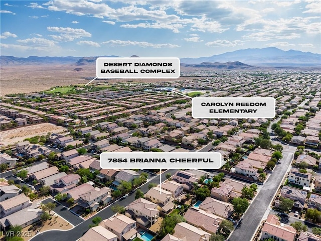 7854 Brianna Cheerful Ave, Las Vegas, NV 89178 - aerial perspective of suburban area featuring a mountain backdrop