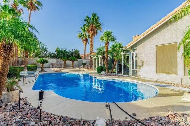 1393 Calmview Pl, Las Vegas, NV 89110 - view of pool with a patio, a fenced backyard, and a diving board
