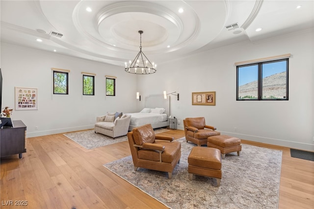 38 Pebble Dunes Ct, Las Vegas, NV 89141 - bedroom with ornamental molding, light wood-type flooring, a chandelier, recessed lighting, and a raised ceiling