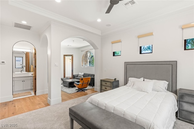 38 Pebble Dunes Ct, Las Vegas, NV 89141 - bedroom with arched walkways, crown molding, light wood finished floors, recessed lighting, and a ceiling fan